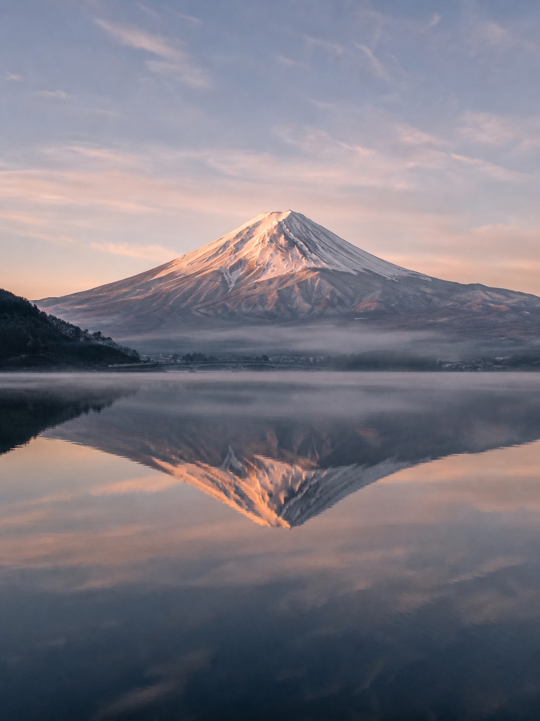 Snow-capped Mount Fuji seen across Lake Kawaguchi